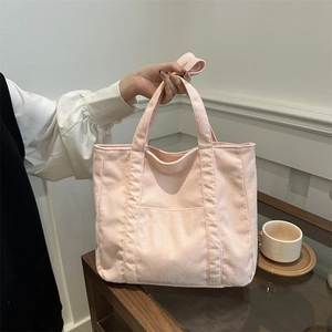 Pink corduroy tote bag with large capacity and shoulder straps for autumn winter 2025