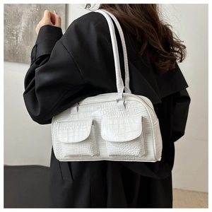 White faux crocodile leather bag detailed texture and dual front flap pockets view