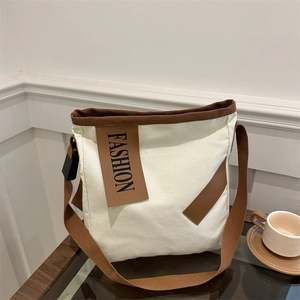 Sac cabas élégant en toile beige avec anses brunes et imprimé FASHION pour le quotidien
