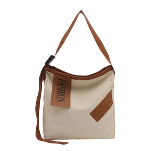 Grand sac cabas minimaliste en toile crème avec bandoulières marron pour le quotidien