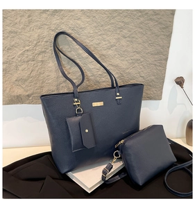 Deep blue lychee leather tote bag set with three pieces and gold hardware detail