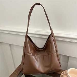 Borsa tote minimalista in pelle PU marrone scuro con tracolla lunga e tasca esterna