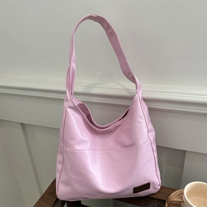 Borsa tote rosa minimalista in ecopelle con grande tasca frontale e tracolla larga