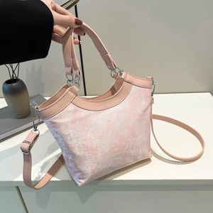 Pink silk jacquard handbag with floral embroidery and adjustable leather shoulder strap