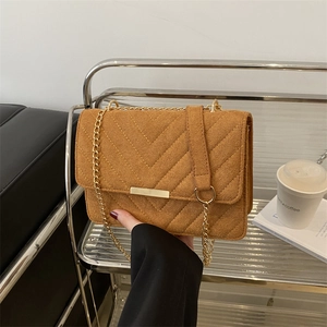 Brown suede-texture crossbody bag with V-shaped quilting and golden chain strap