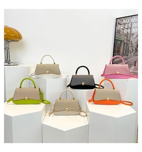Detailed collection of minimalist color-block handbags in six vibrant colors and textures