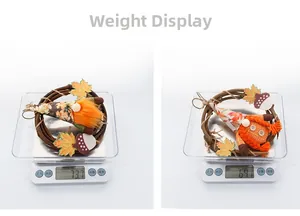 Weight display of fall harvest gnomes on vine wreaths with maple leaves and acorns