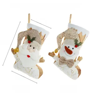 Detail view of 45cm Christmas stockings with Santa and Snowman gold patterns