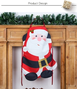 Close-up of Santa Claus apron featuring gold sequin belt buckle and festive design