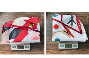Detailed weight comparison of two festive Christmas aprons in santa and reindeer styles