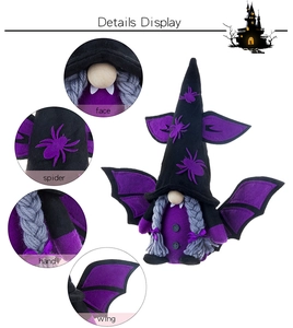 Detail display of Halloween gnome showing spider hat, bat wings and grey braids