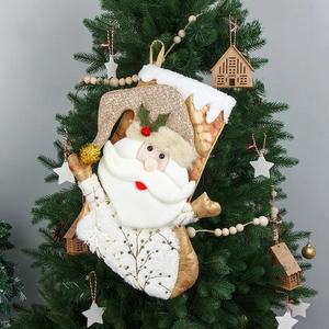 Classic 3D Santa Christmas stocking with golden sequins and plush trim hanging on a tree
