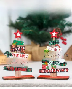 Macro shot of two DIY wooden Christmas trees with gnome prints and red star toppers