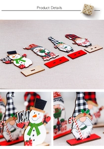 Detail of DIY Christmas wooden table ornaments with snowmen and gnomes on rectangular bases