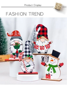 Set of four wooden Christmas gnomes and snowman desktop ornaments on display stands