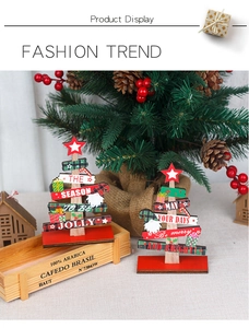 Detail of DIY wooden Christmas tree tabletop decor with festive plaid and star patterns