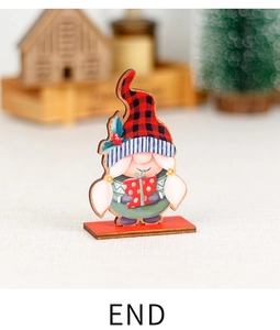Close-up of wooden Christmas gnome ornament with red plaid hat and gift box on wood base