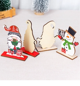 Detail of 4pcs wooden Christmas figurines including snowman and DIY gnome silhouettes