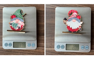 Detailed view of lightweight Christmas gnome wood crafts on a scale for weight check