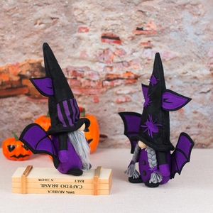 Pair of Halloween bat gnome plush ornaments with wings and purple hats for decor