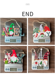 Weight measurement of wooden Christmas gnome signs with Joy and Noel hanging letters