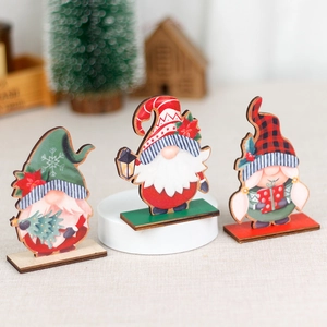 Three-piece wooden Christmas gnome desktop ornaments with festive red and green holiday motifs