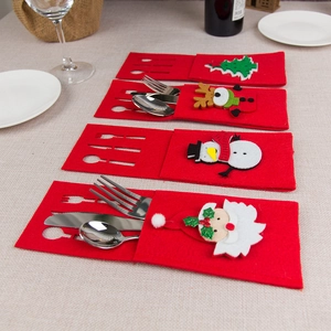 Set of 4 Christmas felt cutlery holders with Santa Snowman Reindeer and Tree designs