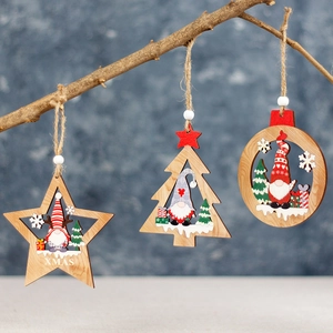 Wooden Christmas gnome ornaments featuring hollow star and tree designs with Xmas text