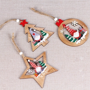 Set of 3 wooden Christmas ornaments featuring hollow laser-cut gnomes and stars