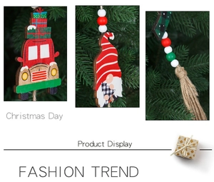 Detail of Christmas gnome and red truck wood pendants with colorful beads and tassels