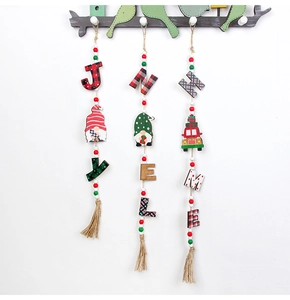 Close-up of three Christmas wooden bead garlands with gnomes and buffalo plaid letters
