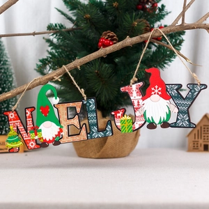 Festive wooden Noel and Joy hanging signs with Nordic gnome and Christmas tree designs