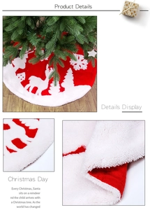 Detail view of plush red Christmas tree skirt featuring white reindeer and snowflake motifs