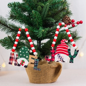 Christmas wood bead hanging tags with Joy and Noel letters and Santa Gnome designs