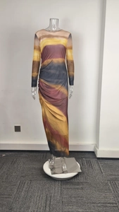 Detailed view of the side ruching and colorful gradient print on long sleeve slim dress