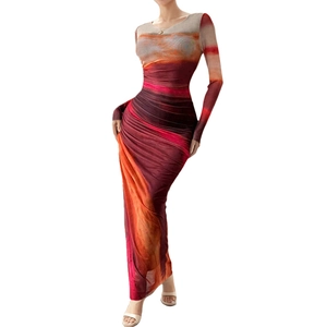 Slim fit long sleeve maxi dress featuring sunset gradient print and pleated texture