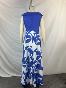 Detail view of the floral print skirt and royal blue off-shoulder bodice on a mannequin