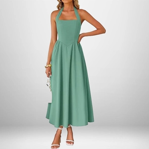 Elegant sage green halter neck backless maxi dress with a flowing waist-cinching silhouette