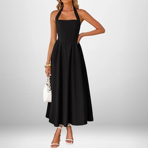 Front view of an elegant black halter backless A-line midi dress with a cinched waist