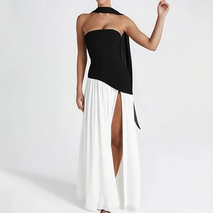 Elegant black and white strapless maxi dress with side slit and neck scarf detail