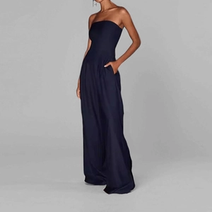 Elegant navy blue strapless wide-leg jumpsuit with high waist and pockets for women