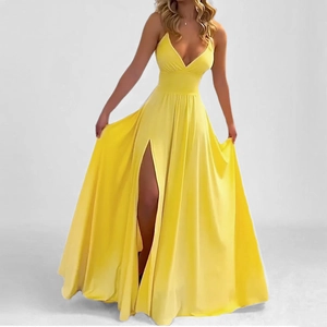 Detail view of bright yellow maxi dress featuring a V-neckline and high side slit