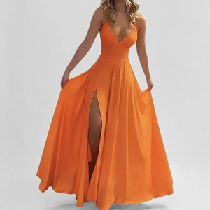 Detail view of vibrant orange deep V-neck maxi dress with high slit and thin straps