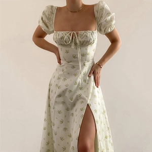 Close-up of French floral dress showing square neckline with drawstring and puff sleeves