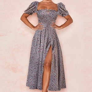 Detail of square neckline with small bow and side slit on floral sundress