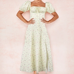 Detail of French floral dress showing square neck and elastic smocked bodice texture