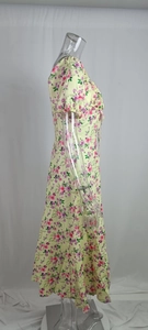 Detail of floral puff sleeve midi dress with drawstring bow and pink floral pattern
