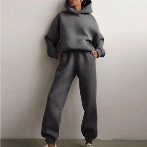 Detail view of dark grey oversized hoodie and joggers set with premium fleece lining