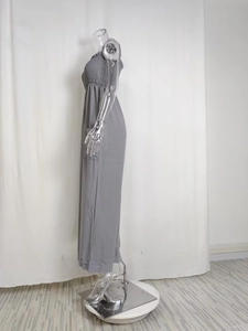 Detail of grey strapless jumpsuit featuring elasticated smocked bust and side cargo pockets