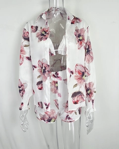 Detailed view of women's three-piece floral set with elastic cuffs and vibrant print